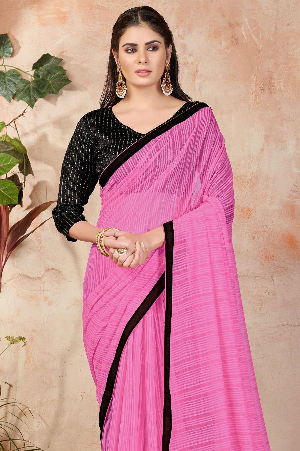 Get this Black Saree with Pink Embroidered Blouse to look gorgeous