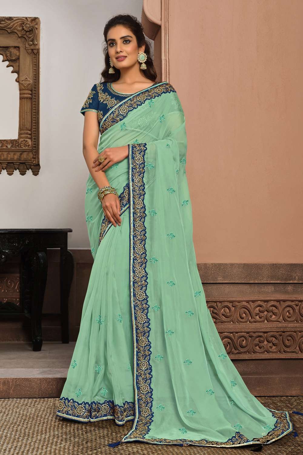 Orange and sea blue banarasi saree with sea green blouse – Threads