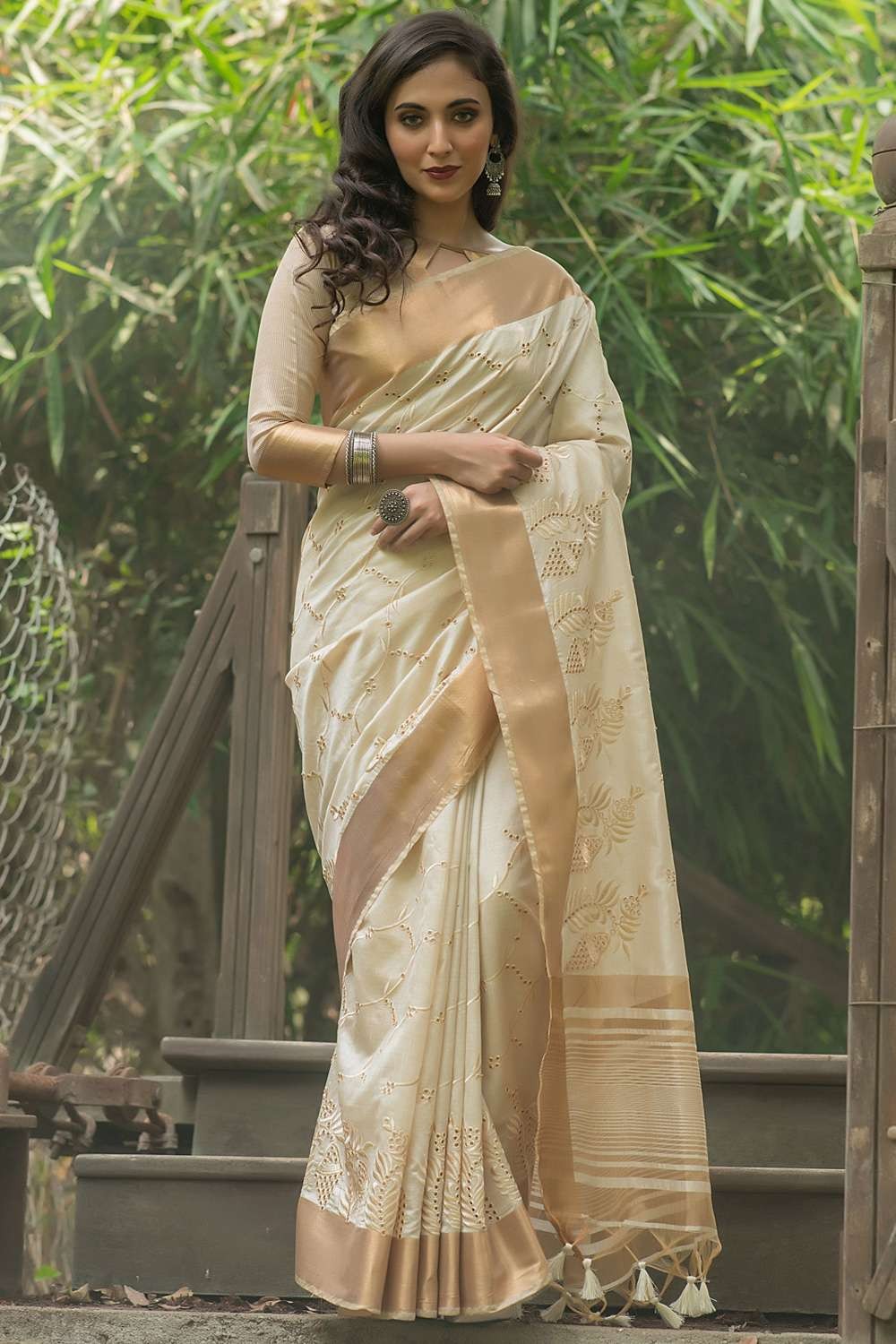 Utsav Fashion - This charming cream saree beautifully... | Facebook