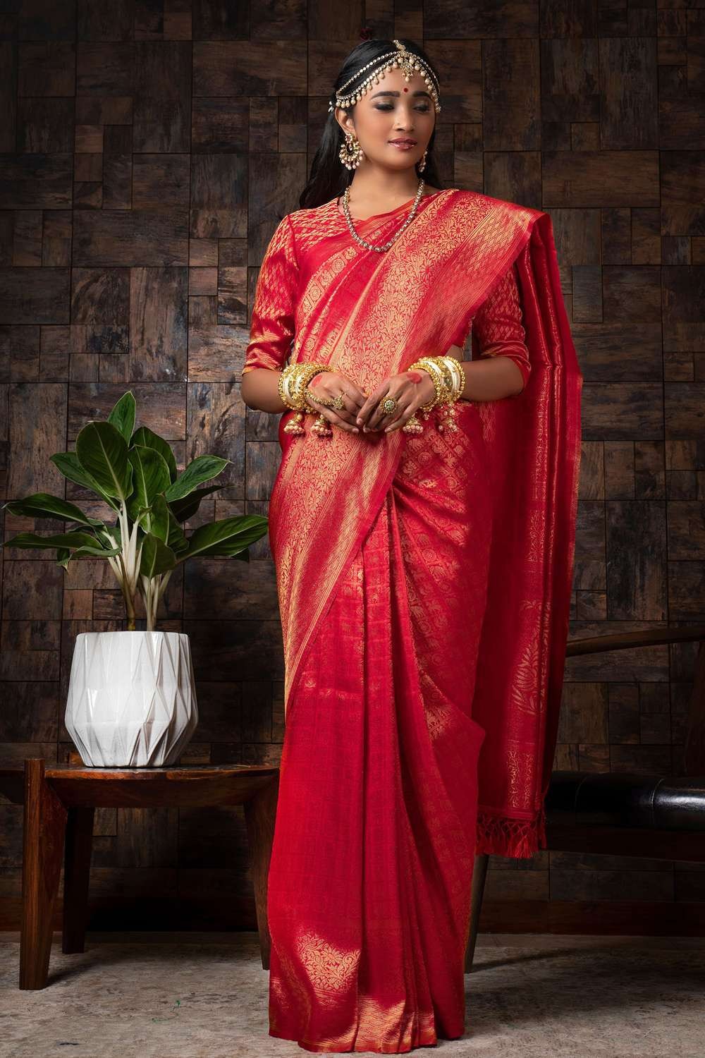 In a bridal look in a red color pattu / kanjeevaram saree, green color  elbow lengt… | Bridal sarees south indian, Indian wedding outfits, South  indian wedding saree