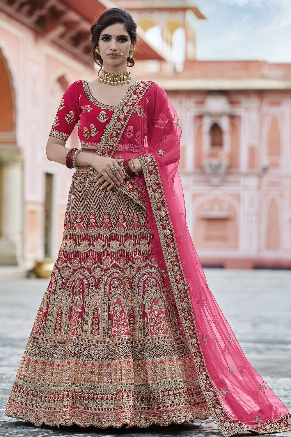 Buy Rani Pink Lehenga Choli In Raw Silk With Hand Embroidered Cluster Of  Flowers Cascading Into Floral Buttis KALKI Fashion India
