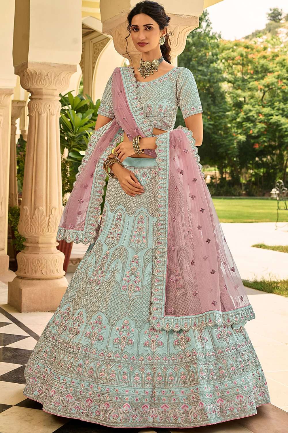 Sky blue colored Embroidered Lehenga - Rent