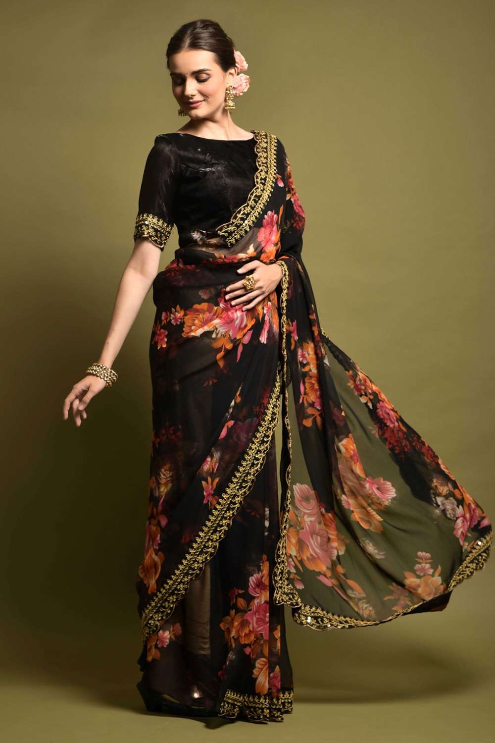 A silk georgette cherry printed sari with a black embroidered