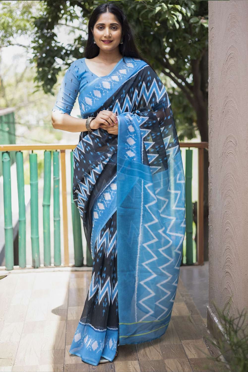 Silkyway Boutique on Instagram: “Jet black kanchivaram silk sari with a  beautiful aquamarine blue… | Silk saree blouse designs, Saree blouse  designs, Blouse designs