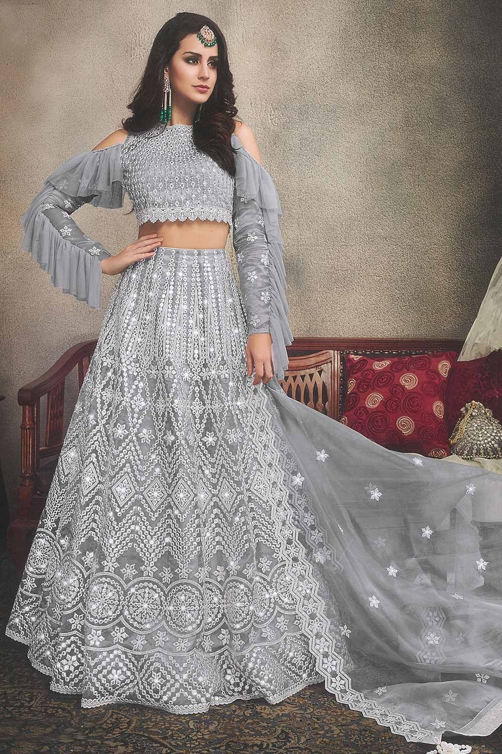 Grey color Lehenga choli with matching dupatta.