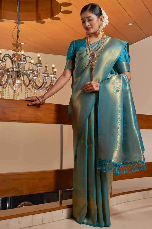 Image of Portrait Of Beautiful Indian Girl Wearing Traditional Indian Saree,  Gold Jewellery And Bangles Holding Plate Of Religious Offering In Kolkata,  India On September 2020-FU032916-Picxy