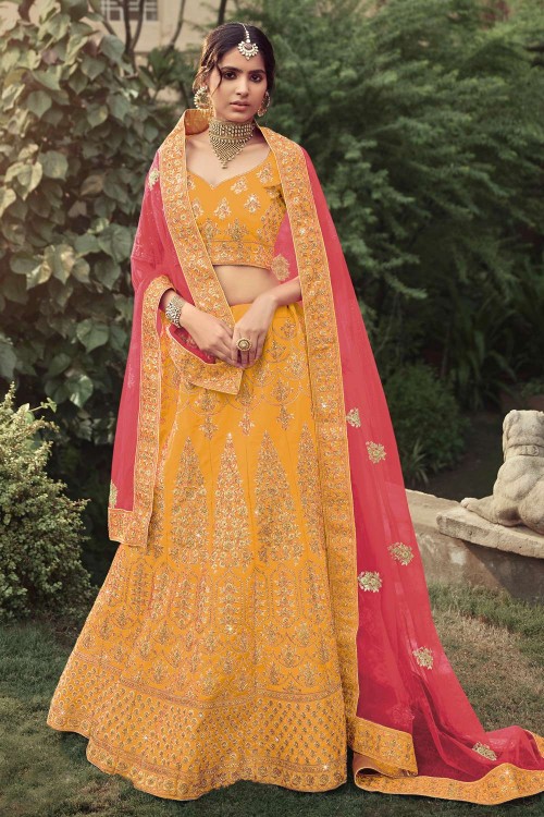 Tuscan yellow lehenga with draped dupatta paired with red blouse KALKI  Fashion India